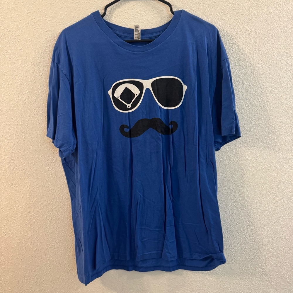 Blue Baseball Life 365 “Mustache Man” Shirt.